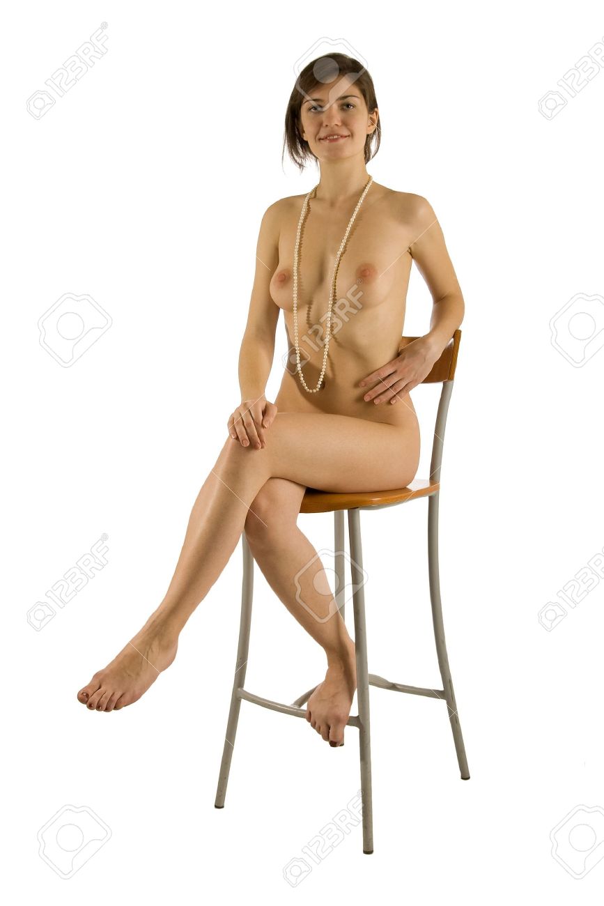 girl sitting naked in chair